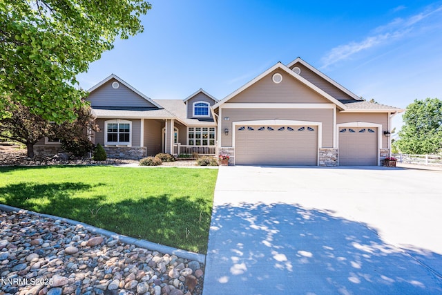 1601 Jones St, Minden, NV 89423 - ranch-style home with stone siding, a garage, and concrete driveway