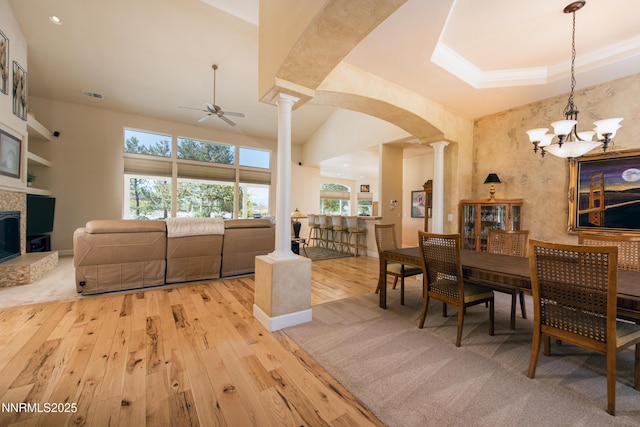 1601 Jones St, Minden, NV 89423 - dining area featuring decorative columns, hardwood / wood-style floors, arched walkways, and ceiling fan