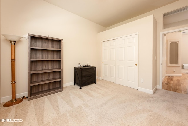 1601 Jones St, Minden, NV 89423 - carpeted bedroom with a closet and baseboards
