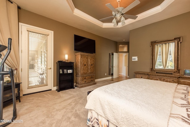 1601 Jones St, Minden, NV 89423 - bedroom featuring access to outside, light colored carpet, a tray ceiling, multiple windows, and ornamental molding