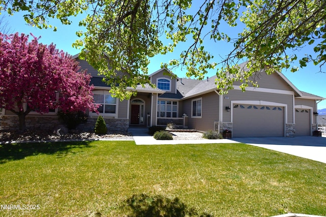 1601 Jones St, Minden, NV 89423 - view of front of house with stone siding, a garage, a front yard, and concrete driveway