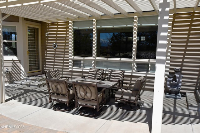 1601 Jones St, Minden, NV 89423 - view of patio / terrace with a pergola and outdoor dining space