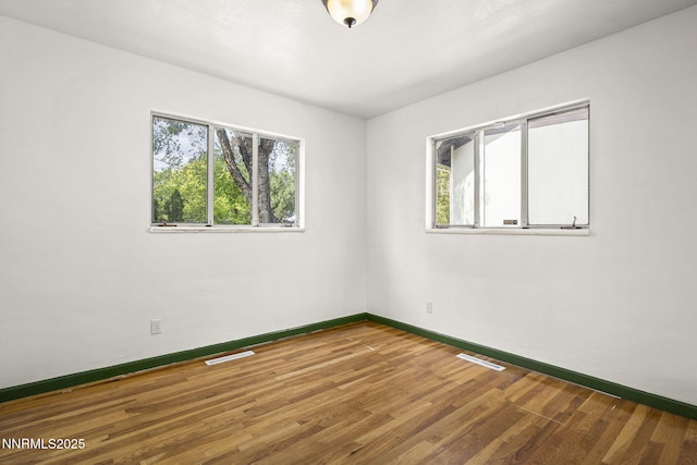 438 Glenmanor Dr, Reno, NV 89509 - empty room featuring baseboards and wood finished floors