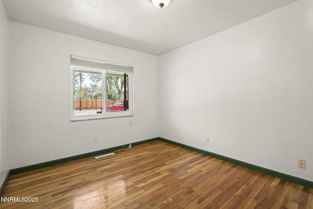 438 Glenmanor Dr, Reno, NV 89509 - unfurnished room with wood finished floors and baseboards