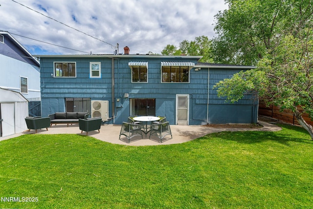 438 Glenmanor Dr, Reno, NV 89509 - back of house featuring a patio, a lawn, an outdoor living space, and a chimney