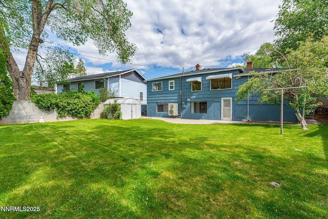438 Glenmanor Dr, Reno, NV 89509 - rear view of property featuring a chimney and a yard