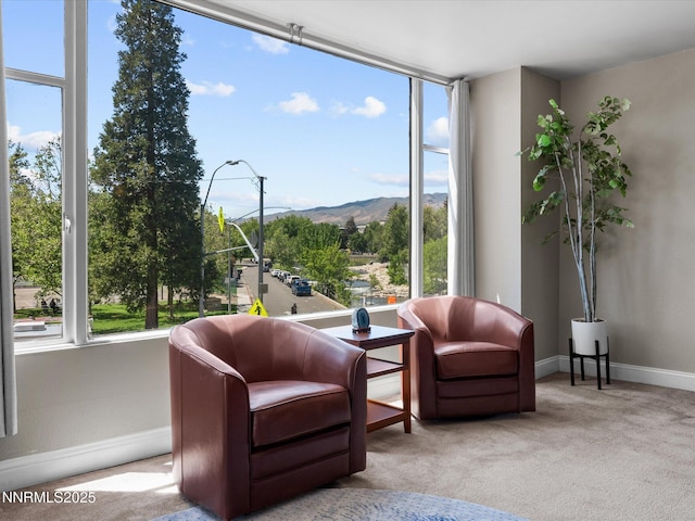 280 Island Ave Unit 302, Reno, NV 89501 - sitting room with a mountain view, carpet floors, and baseboards