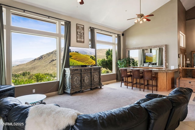 6 Canyon Dr, Carson City, NV 89703 - living area with a ceiling fan, carpet floors, high vaulted ceiling, and baseboards
