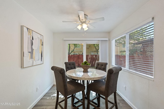 1821 Fargo Way, Sparks, NV 89434 - dining area with dark wood-style floors, baseboards, and a ceiling fan