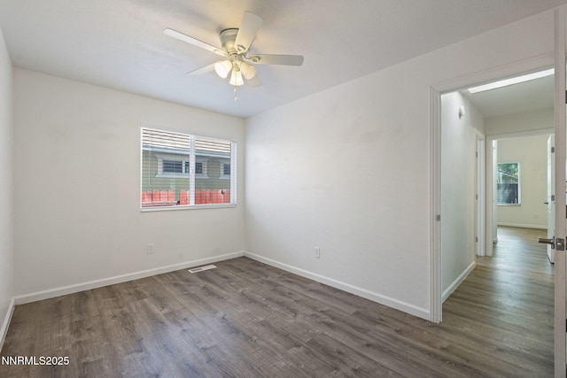 1821 Fargo Way, Sparks, NV 89434 - spare room with wood finished floors, ceiling fan, and baseboards
