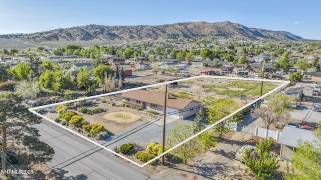 11815 Mistletoe St, Reno, NV 89506 - aerial perspective of suburban area featuring property parcel outlined and a mountainous background