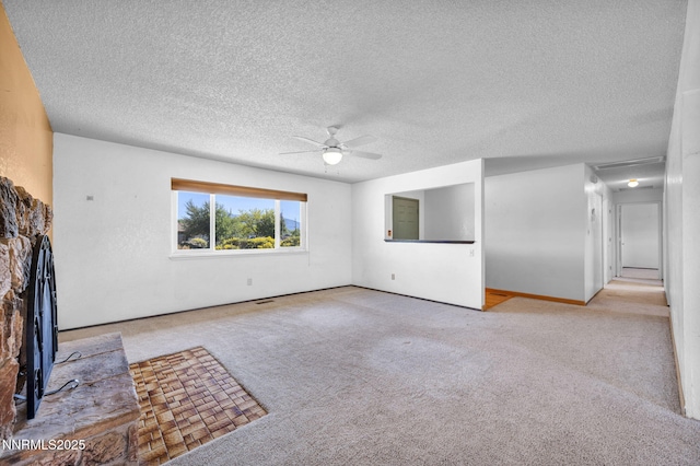 11815 Mistletoe St, Reno, NV 89506 - unfurnished living room featuring carpet flooring, ceiling fan, a textured ceiling, and a baseboard radiator