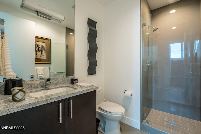 310 James Canyon Loop, Genoa, NV 89411 - bathroom with a stall shower, toilet, vanity, and baseboards