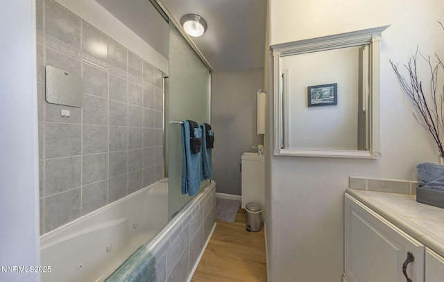 223 Lyons Ave, Zephyr Cove, NV 89448 - full bathroom with bathtub / shower combination, wood finished floors, and vanity