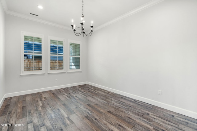 11621 Desert Shadow Dr, Sparks, NV 89441 - unfurnished room featuring a chandelier, crown molding, baseboards, dark wood finished floors, and recessed lighting