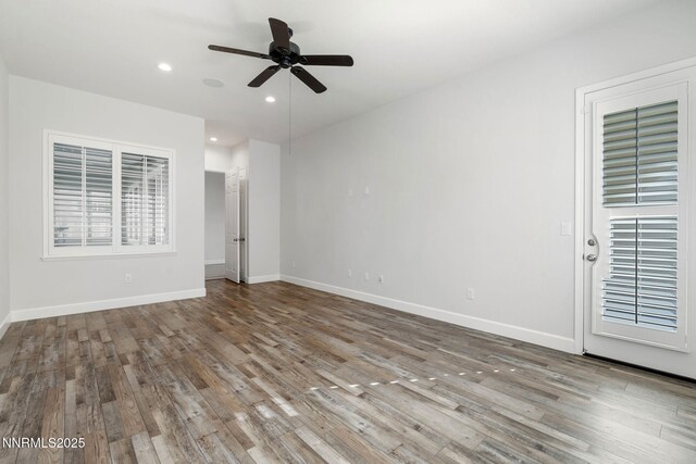 11621 Desert Shadow Dr, Sparks, NV 89441 - empty room with wood finished floors, a ceiling fan, baseboards, and recessed lighting