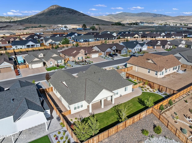 11621 Desert Shadow Dr, Sparks, NV 89441 - aerial perspective of suburban area with a mountain backdrop