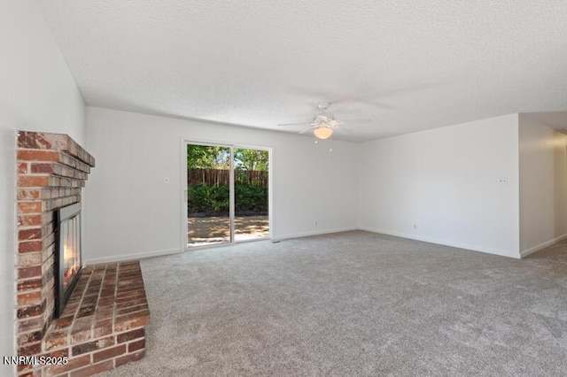 2995 Santa Ana Dr, Reno, NV 89502 - unfurnished living room with ceiling fan, a fireplace, carpet, baseboards, and a textured ceiling