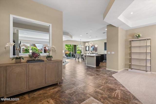 9822 Dyevera Ln, Reno, NV 89521 - hall featuring a chandelier, recessed lighting, and baseboards
