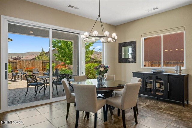 9822 Dyevera Ln, Reno, NV 89521 - dining area featuring a chandelier