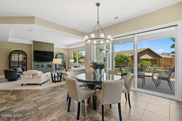 9822 Dyevera Ln, Reno, NV 89521 - dining room with a chandelier and light tile patterned flooring