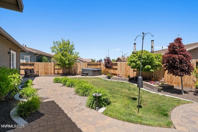 9822 Dyevera Ln, Reno, NV 89521 - view of yard featuring a hot tub and a patio
