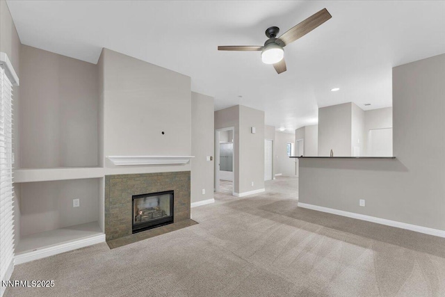 900 S Meadows Pkwy Unit 5222, Reno, NV 89521 - unfurnished living room with ceiling fan, carpet flooring, baseboards, and a fireplace with flush hearth