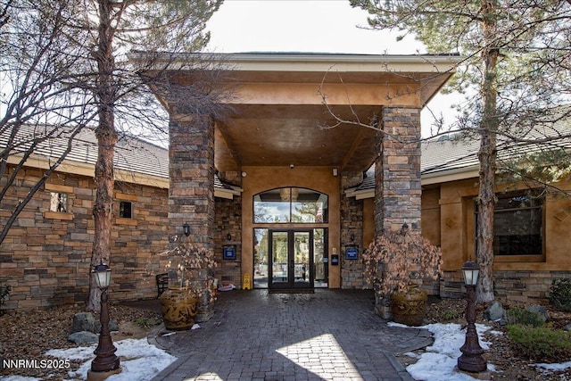 900 S Meadows Pkwy Unit 5222, Reno, NV 89521 - view of exterior entry featuring french doors, stone siding, and stucco siding
