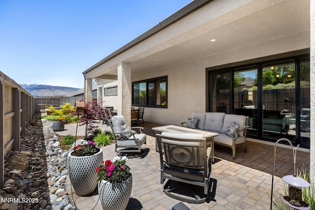 3060 Feathertop Dr, Reno, NV 89521 - fenced backyard featuring a patio and an outdoor living space