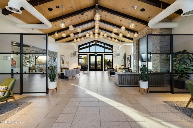 3060 Feathertop Dr, Reno, NV 89521 - common area with high vaulted ceiling and wood ceiling with exposed beams