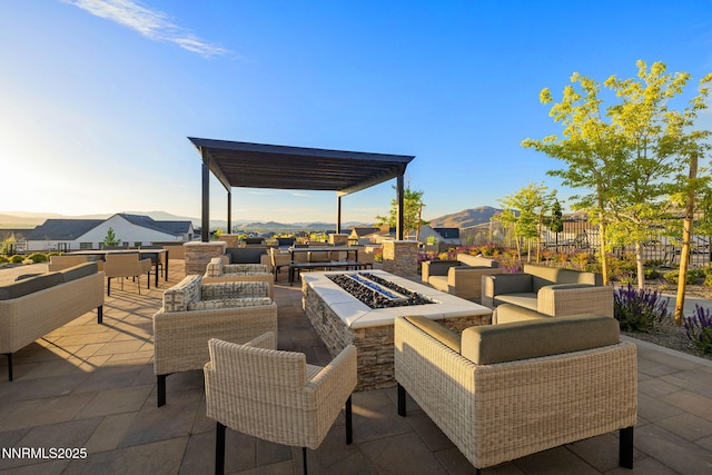3060 Feathertop Dr, Reno, NV 89521 - view of patio with an outdoor living space with a fire pit