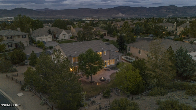 2965 Roundrock Ct, Reno, NV 89511 - aerial overview of property's location featuring nearby suburban area and a mountain backdrop