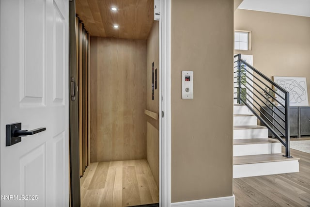 2965 Roundrock Ct, Reno, NV 89511 - elevator featuring wood finished floors and recessed lighting