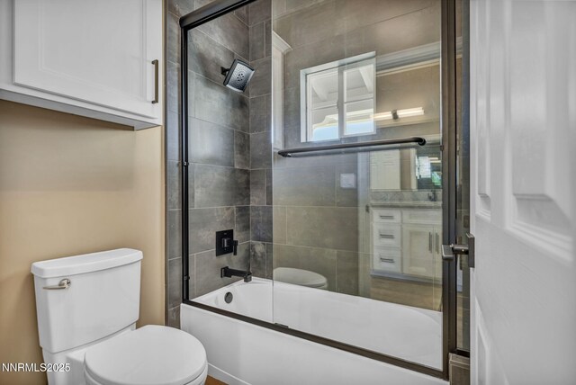 2965 Roundrock Ct, Reno, NV 89511 - bathroom with toilet and bath / shower combo with glass door
