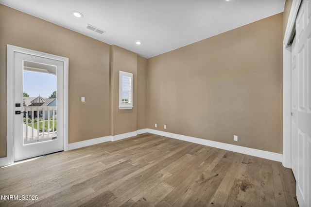 2965 Roundrock Ct, Reno, NV 89511 - spare room with wood finished floors, baseboards, and recessed lighting