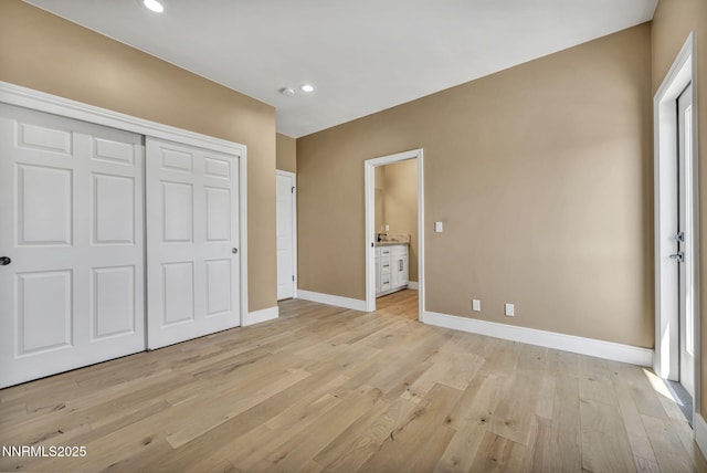 2965 Roundrock Ct, Reno, NV 89511 - unfurnished bedroom with baseboards, light wood-type flooring, a closet, and recessed lighting