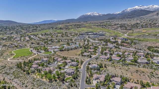 2965 Roundrock Ct, Reno, NV 89511 - aerial overview of property's location featuring a mountainous background and nearby suburban area