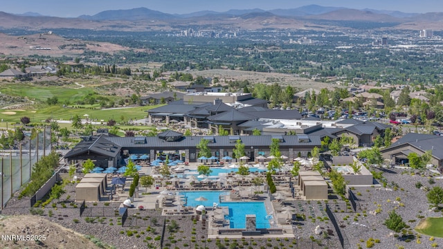 2965 Roundrock Ct, Reno, NV 89511 - aerial view of residential area with a mountain backdrop and a pool area