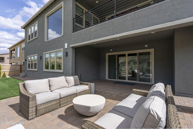 9129 Wild Skies Way, Reno, NV 89523 - view of patio with an outdoor hangout area and a balcony
