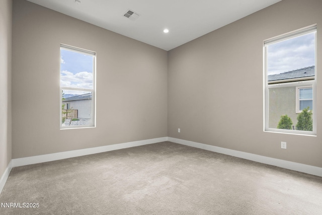 9129 Wild Skies Way, Reno, NV 89523 - unfurnished room featuring plenty of natural light, carpet, baseboards, and recessed lighting