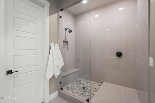 9129 Wild Skies Way, Reno, NV 89523 - bathroom with tiled shower, baseboards, and recessed lighting