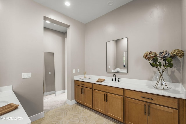 9129 Wild Skies Way, Reno, NV 89523 - bathroom featuring vanity, baseboards, and recessed lighting