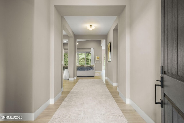 9129 Wild Skies Way, Reno, NV 89523 - hallway featuring baseboards and light wood-type flooring