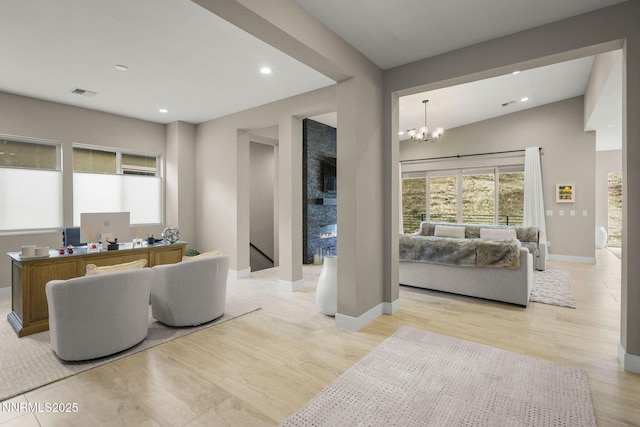 9129 Wild Skies Way, Reno, NV 89523 - living room featuring an office area, recessed lighting, a chandelier, baseboards, and light wood finished floors