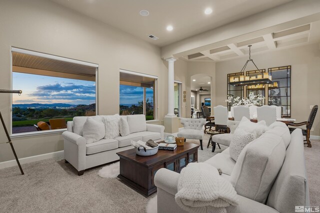5330 Ventana Pkwy, Reno, NV 89511 - living area with coffered ceiling, light carpet, ornate columns, baseboards, and beamed ceiling