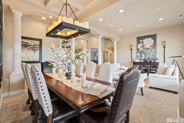 5330 Ventana Pkwy, Reno, NV 89511 - carpeted dining space with decorative columns, recessed lighting, beamed ceiling, and a chandelier