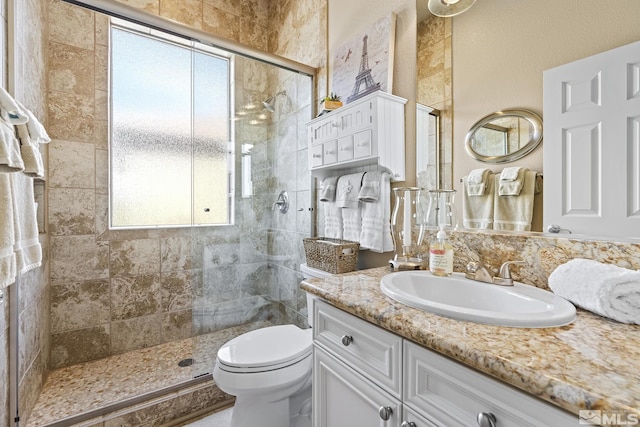5330 Ventana Pkwy, Reno, NV 89511 - full bath with tiled shower, vanity, and toilet