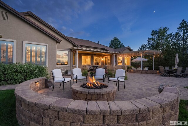 5330 Ventana Pkwy, Reno, NV 89511 - view of patio / terrace featuring a fire pit