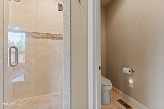 1004 Keystone Ct, Gardnerville, NV 89460 - full bathroom with a shower stall, toilet, and tile patterned floors