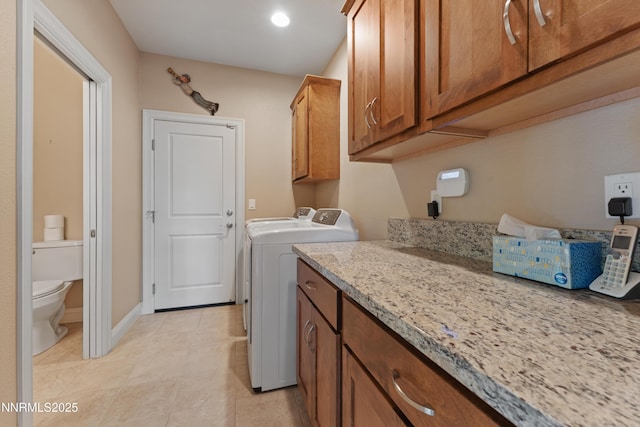 1004 Keystone Ct, Gardnerville, NV 89460 - laundry room with cabinet space, washer and dryer, baseboards, light tile patterned floors, and recessed lighting
